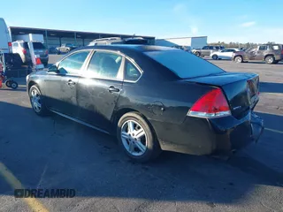 2014 Chevrolet Impala Limited Police Police with VIN 2G1WD5E39E1110595, listed as a IAAI auction lot 41261653 with 141,058 mi miles. Bid and sale history available at carsss.com. Image 3.