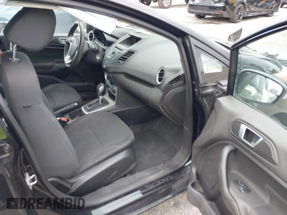 2015 Ford Fiesta SE with VIN 3FADP4BJ5FM130099, listed as a IAAI auction lot 42126960 with 82,299 mi miles and . Bid and sale history available at DreamBid. Image 5.