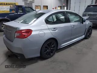 2015 Subaru WRX Premium with VIN JF1VA1D66F8830943, listed as a IAAI auction lot 41282679 with 149,236 mi miles. Bid and sale history available at carsss.com. Image 4.