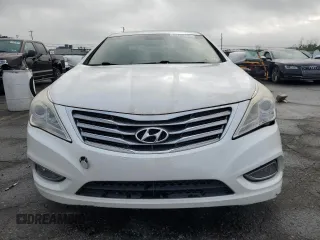 2013 Hyundai Azera с VIN KMHFG4JG8DA228669, выставлен на аукционе Copart как лот 62734185 с пробегом 148 611 миль миль и Чистый • Clean title. История ставок и продаж доступна на DreamBid. Изображение 5.