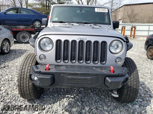 2015 Jeep Wrangler Unlimited Rubicon Hard Rock with VIN 1C4HJWFG4FL575054, listed as a Copart auction lot 51672655 with 130,405 mi miles and Clean title. Bid and sale history available at DreamBid. Image 5.