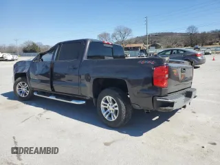 2016 Chevrolet Silverado 1500 LT with VIN 3GCUKREC0GG213703, listed as a Copart auction lot 47558925 with 126,015 mi miles and Salvage Title. Bid and sale history available at DreamBid. Image 2.