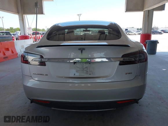 2013 Tesla Model S Performance with VIN 5YJSA1DP6DFP07999, listed as a IAAI auction lot 42284612 with 123,261 mi miles and . Bid and sale history available at DreamBid. Image 17.