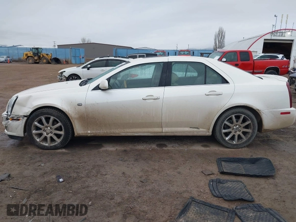 2005 Cadillac STS z VIN 1G6DC67A250231552, wystawiony jako IAAI lot #41765312 z przebiegiem 201 611 mil mil oraz . Historia ofert i sprzedaży dostępna na DreamBid. Obrazek 14.