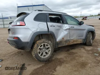 2021 Jeep Cherokee Trailhawk with VIN 1C4PJMBX2MD143446, listed as a Copart auction lot 55166945 with 83,841 mi miles and Salvage title. Bid and sale history available at DreamBid. Image 3.