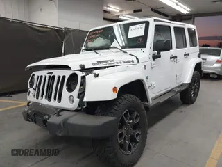 2017 Jeep Wrangler Unlimited Sahara with VIN 1C4BJWEG2HL700840, listed as a IAAI auction lot 42631036 with 60,610 mi miles and . Bid and sale history available at DreamBid. Image 17.