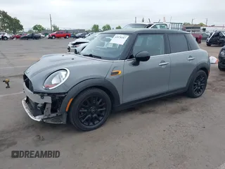 2015 MINI Hardtop 4 Door with VIN WMWXS5C52FT829699, listed as a IAAI auction lot 42078187 with 59,641 mi miles and . Bid and sale history available at DreamBid. Image 2.