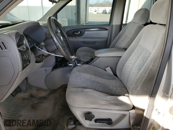 2005 GMC Envoy SLE with VIN 1GKDS13S852374516, listed as a Copart auction lot 42409725 with 299,816 mi miles and Salvage Title. Bid and sale history available at carsss.com. Image 7.