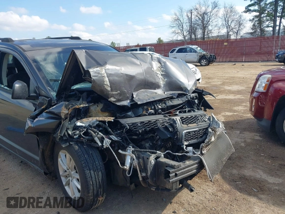2015 Dodge Journey SXT with VIN 3C4PDCBG0FT733952, listed as a IAAI auction lot 41521687 with 80,974 mi miles and . Bid and sale history available at DreamBid. Image 6.
