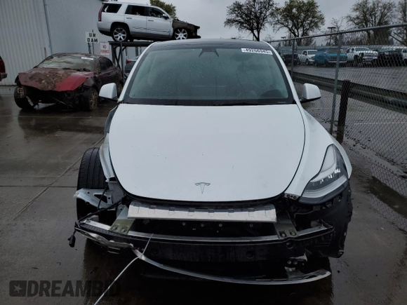 2022 Tesla Model Y Long Range with VIN 7SAYGDEE1NF491488, listed as a Copart auction lot 49266945 with 44,703 mi miles and Salvage Title. Bid and sale history available at carsss.com. Image 5.