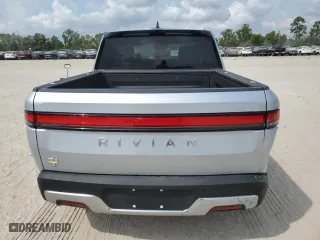2023 Rivian R1T Adventure with VIN 7FCTGAAA1PN020612, listed as a Copart auction lot 72971044 with 7,858 mi miles and Salvage Title. Bid and sale history available at carsss.com. Image 6.