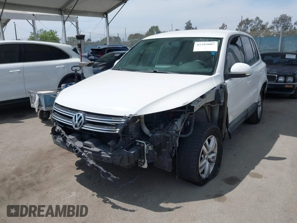 2014 Volkswagen Tiguan SEL with VIN WVGAV3AX0EW524669, listed as a IAAI auction lot 42289003 with 94,513 mi miles and . Bid and sale history available at DreamBid. Image 18.