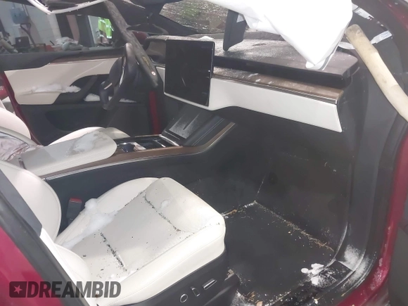 2023 Tesla Model X with VIN 7SAXCDE51PF403632, listed as a IAAI auction lot 41328722 with Not Provided miles and . Bid and sale history available at DreamBid. Image 5.