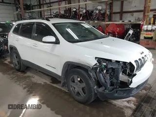 2014 Jeep Cherokee Latitude with VIN 1C4PJMCS5EW288909, listed as a IAAI auction lot 41531117 with 108,971 mi miles and . Bid and sale history available at carsss.com. Image 1.