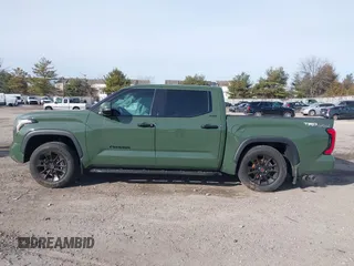 2023 Toyota Tundra Limited with VIN 5TFJA5DBXPX081603, listed as a IAAI auction lot 41293156 with 15,155 mi miles and . Bid and sale history available at DreamBid. Image 14.