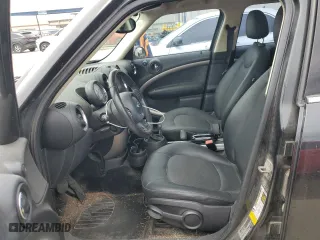 2013 MINI Cooper Countryman with VIN WMWZB3C56DWM08030, listed as a Copart auction lot 50261555 with 91,111 mi miles and Salvage Title. Bid and sale history available at carsss.com. Image 7.
