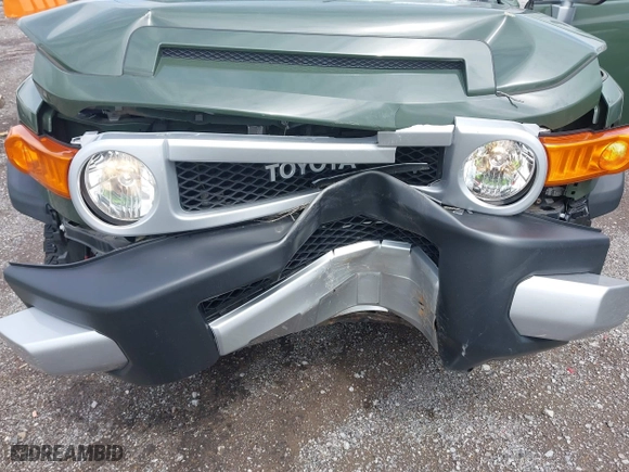 2014 Toyota FJ Cruiser with VIN JTEBU4BF1EK203587, listed as a IAAI auction lot 41978010 with 62,438 mi miles. Bid and sale history available at carsss.com. Image 6.