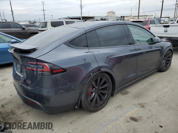 2023 Tesla Model X Plaid with VIN 7SAXCBE62PF405922, listed as a Copart auction lot 53826915 with 1,358 mi miles and Salvage Title. Bid and sale history available at DreamBid. Image 3.