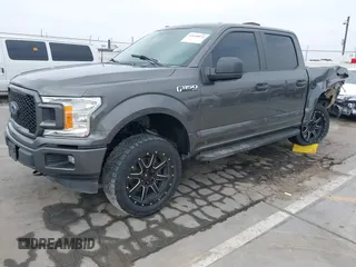 2018 Ford F-150 XL with VIN 1FTEW1EP4JKD45070, listed as a IAAI auction lot 42648874 with 140,424 mi miles and . Bid and sale history available at DreamBid. Image 2.