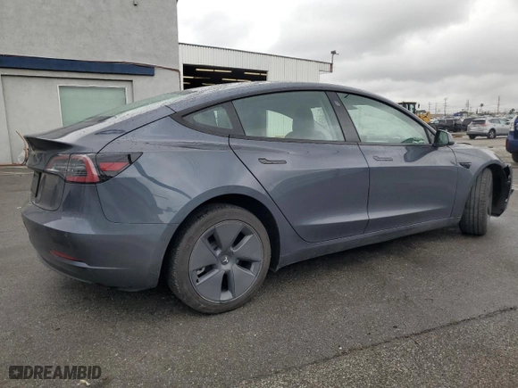 2021 Tesla Model 3 Standard Range Plus with VIN 5YJ3E1EA1MF911340, listed as a Copart auction lot 45011375 with 54,084 mi miles and Salvage Title. Bid and sale history available at carsss.com. Image 3.