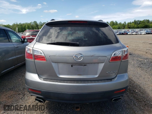 2011 Mazda CX-9 Touring z VIN JM3TB3CV3B0323789, wystawiony jako Copart lot #57762505 z przebiegiem 151 942 mil mil oraz Czysty tytuł • Clean title. Historia ofert i sprzedaży dostępna na DreamBid. Obrazek 6.