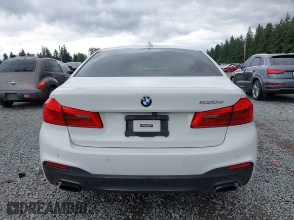 2019 BMW 5 Series 530e with VIN WBAJA9C57KB389401, listed as a IAAI auction lot 42565098 with 52,343 mi miles and . Bid and sale history available at DreamBid. Image 17.