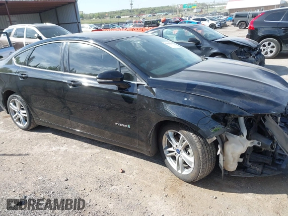 2016 Ford Fusion SE Hybrid с VIN 3FA6P0LU4GR204062, выставлен на аукционе IAAI как лот 42041634 с пробегом 138 876 миль миль и . История ставок и продаж доступна на DreamBid. Изображение 14.