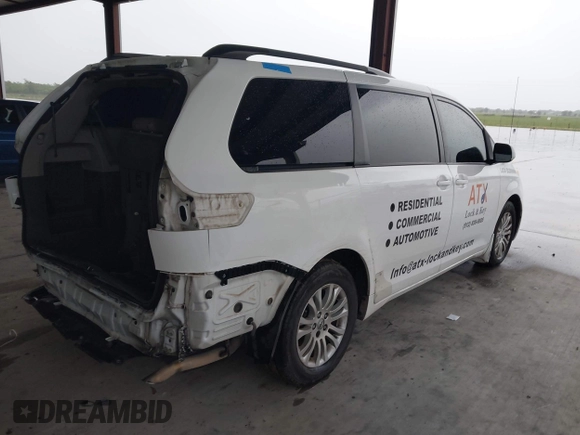 2012 Toyota Sienna XLE AAS with VIN 5TDYK3DC6CS228816, listed as a IAAI auction lot 42483715 with 206,925 mi miles and . Bid and sale history available at DreamBid. Image 4.