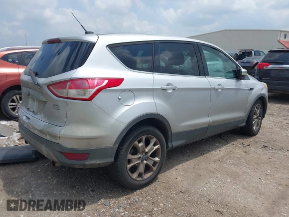 2013 Ford Escape SEL with VIN 1FMCU9H95DUA48886, listed as a IAAI auction lot 42117937 with 244,101 mi miles. Bid and sale history available at carsss.com. Image 4.