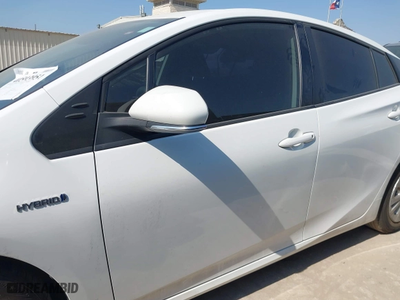2021 Toyota Prius L Eco with VIN JTDKAMFU6M3141263, listed as a IAAI auction lot 40593951 with 95,921 mi miles. Bid and sale history available at carsss.com. Image 14.