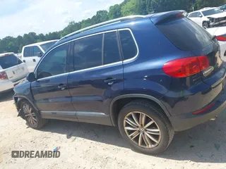 2012 Volkswagen Tiguan SE with VIN WVGAV7AX7CW534703, listed as a IAAI auction lot 42463358 with 119,699 mi miles and . Bid and sale history available at DreamBid. Image 14.