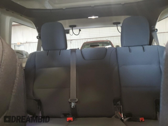 2023 Jeep Wrangler Sport z VIN 1C4HJXDG1PW619939, wystawiony jako Copart lot #51923345 z przebiegiem 24 204 mil mil oraz Szkoda całkowita • Salvage title. Historia ofert i sprzedaży dostępna na DreamBid. Obrazek 10.