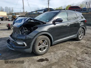 2018 Hyundai Santa Fe 2.4L z VIN 5NMZUDLBXJH083759, wystawiony jako Copart lot #53168535 z przebiegiem Nie podano mil oraz Szkody całkowita. Historia ofert i sprzedaży dostępna na DreamBid. Obrazek 1.
