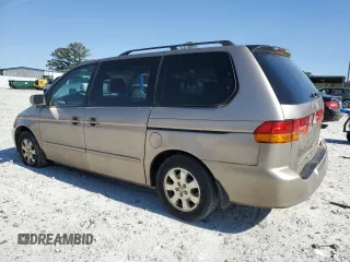 2004 Honda Odyssey EX-L with VIN 5FNRL18974B085790, listed as a Copart auction lot 49159665 with 179,207 mi miles and Salvage Title. Bid and sale history available at DreamBid. Image 2.