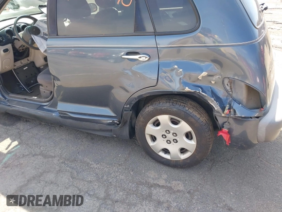 2003 Chrysler PT Cruiser with VIN 3C4FY48B13T594105, listed as a IAAI auction lot 42069940 with 154,343 mi miles. Bid and sale history available at carsss.com. Image 14.