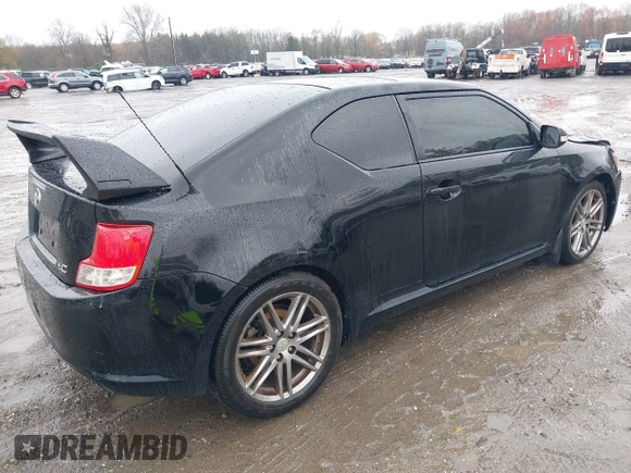 2013 Scion tC with VIN JTKJF5C79D3051664, listed as a IAAI auction lot 42027579 with 211,322 mi miles. Bid and sale history available at carsss.com. Image 4.