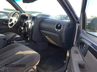 2003 GMC Envoy SLE with VIN 1GKDT13S132377154, listed as a IAAI auction lot 41484891 with 226,008 mi miles. Bid and sale history available at carsss.com. Image 5.