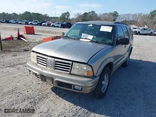 2000 Oldsmobile Bravada with VIN 1GHDT13W3Y2231550, listed as a IAAI auction lot 41518286 with 313,805 mi miles. Bid and sale history available at carsss.com. Image 2.