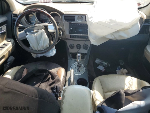 2009 Chrysler Sebring Limited with VIN 1C3LC56V39N566582, listed as a Copart auction lot 70522454 with 148,113 mi miles and Salvage Title. Bid and sale history available at carsss.com. Image 8.