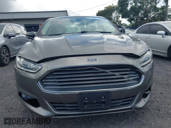 2013 Ford Fusion SE Hybrid z VIN 3FA6P0LUXDR181849, wystawiony jako IAAI lot #41949276 z przebiegiem 112 688 mil mil oraz . Historia ofert i sprzedaży dostępna na DreamBid. Obrazek 12.