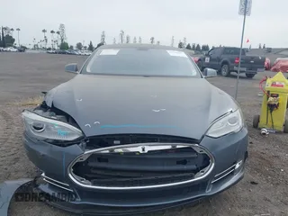 2013 Tesla Model S with VIN 5YJSA1AG5DFP13149, listed as a IAAI auction lot 42116437 with 140,999 mi miles. Bid and sale history available at carsss.com. Image 13.