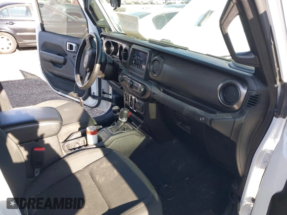 2022 Jeep Gladiator Willys with VIN 1C6HJTAG1NL117631, listed as a IAAI auction lot 41230291 with 33,463 mi miles and . Bid and sale history available at DreamBid. Image 5.