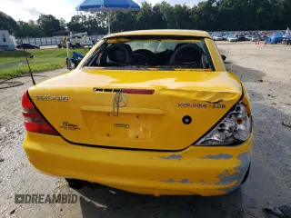 1999 Mercedes-Benz SLK-Class with VIN WDBKK47F9XF076441, listed as a Copart auction lot 73745154 with 104,481 mi miles and Salvage Title. Bid and sale history available at carsss.com. Image 6.