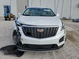 2024 Cadillac XT5 FWD Premium Luxury with VIN 1GYKNCRSXRZ745180, listed as a Copart auction lot 87627615 with 6,753 mi miles and Salvage Title. Bid and sale history available at carsss.com. Image 5.