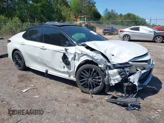 2022 Toyota Camry XSE z VIN 4T1K61AKXNU073823, wystawiony jako IAAI lot #42033514 z przebiegiem 73 943 mil mil oraz . Historia ofert i sprzedaży dostępna na DreamBid. Obrazek 1.
