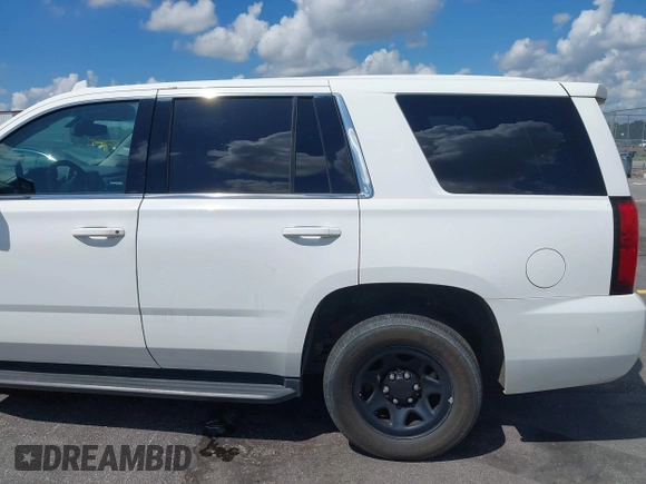 2018 Chevrolet Tahoe Commercial z VIN 1GNLCDEC1JR155210, wystawiony jako IAAI lot #42845068 z przebiegiem 159 456 mil mil oraz . Historia ofert i sprzedaży dostępna na DreamBid. Obrazek 20.