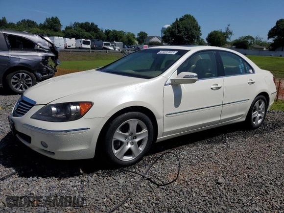 2006 Acura RL z VIN JH4KB16576C012132, wystawiony jako Copart lot #61897805 z przebiegiem 143 101 mil mil oraz Szkoda całkowita • Salvage title. Historia ofert i sprzedaży dostępna na DreamBid. Obrazek 1.