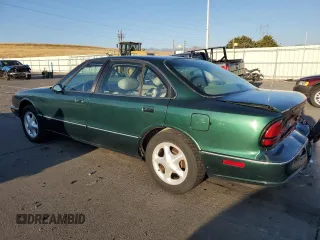 1996 Oldsmobile LSS z VIN 1G3HY52K1T4801881, wystawiony jako Copart lot #75327304 z przebiegiem 123 374 mil mil oraz Szkody całkowita. Historia ofert i sprzedaży dostępna na DreamBid. Obrazek 2.