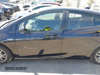 2020 Toyota Prius L Eco z VIN JTDKARFU1L3117772, wystawiony jako IAAI lot #40077005 z przebiegiem 71 892 mil mil oraz . Historia ofert i sprzedaży dostępna na DreamBid. Obrazek 14.
