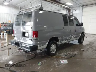 2014 Ford Econoline Cargo Commercial with VIN 1FTNE2EW4EDA64221, listed as a IAAI auction lot 41628147 with 190,018 mi miles and . Bid and sale history available at DreamBid. Image 4.